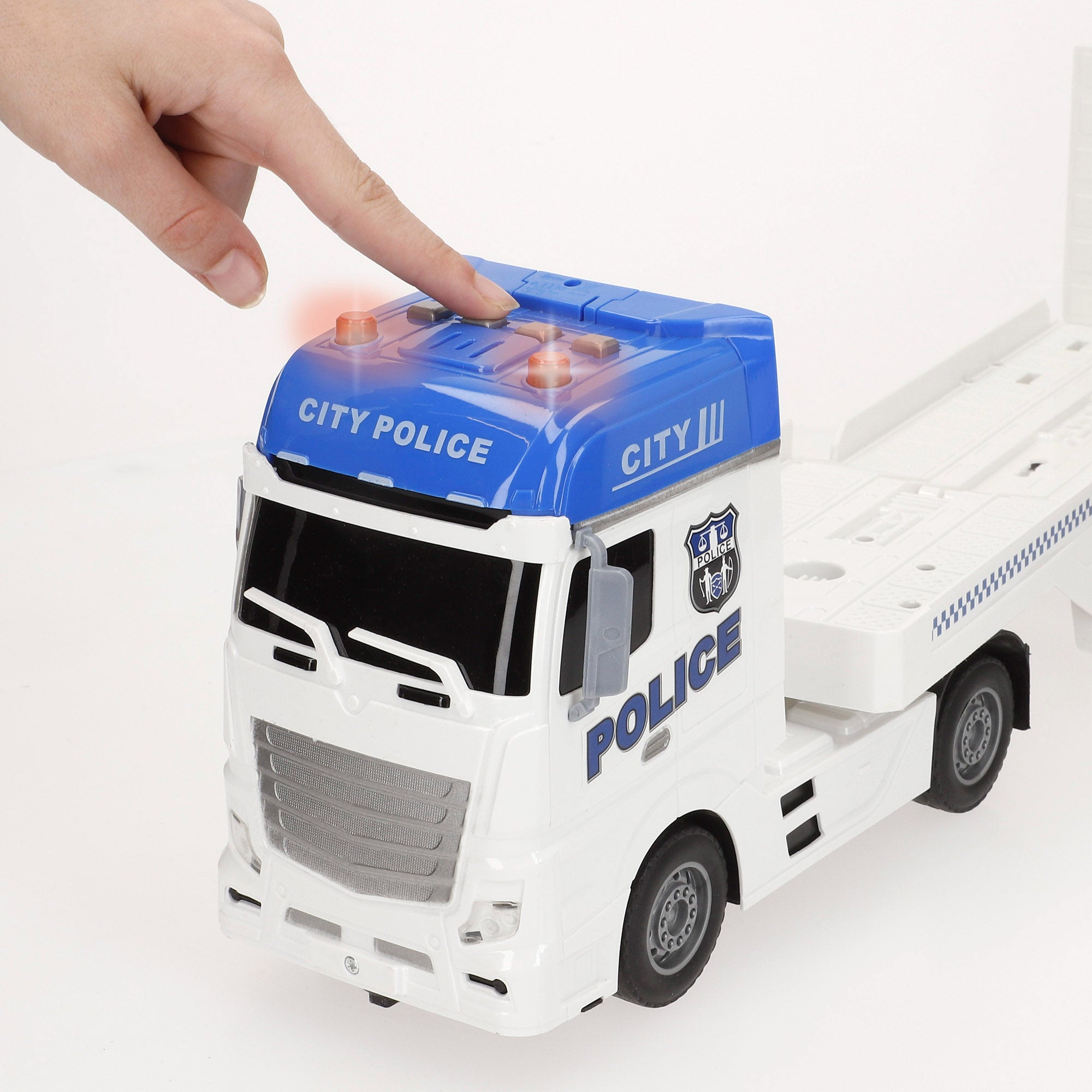 Camión portavehículos policía fricción con luz y sonido 1:12 Speed & Go