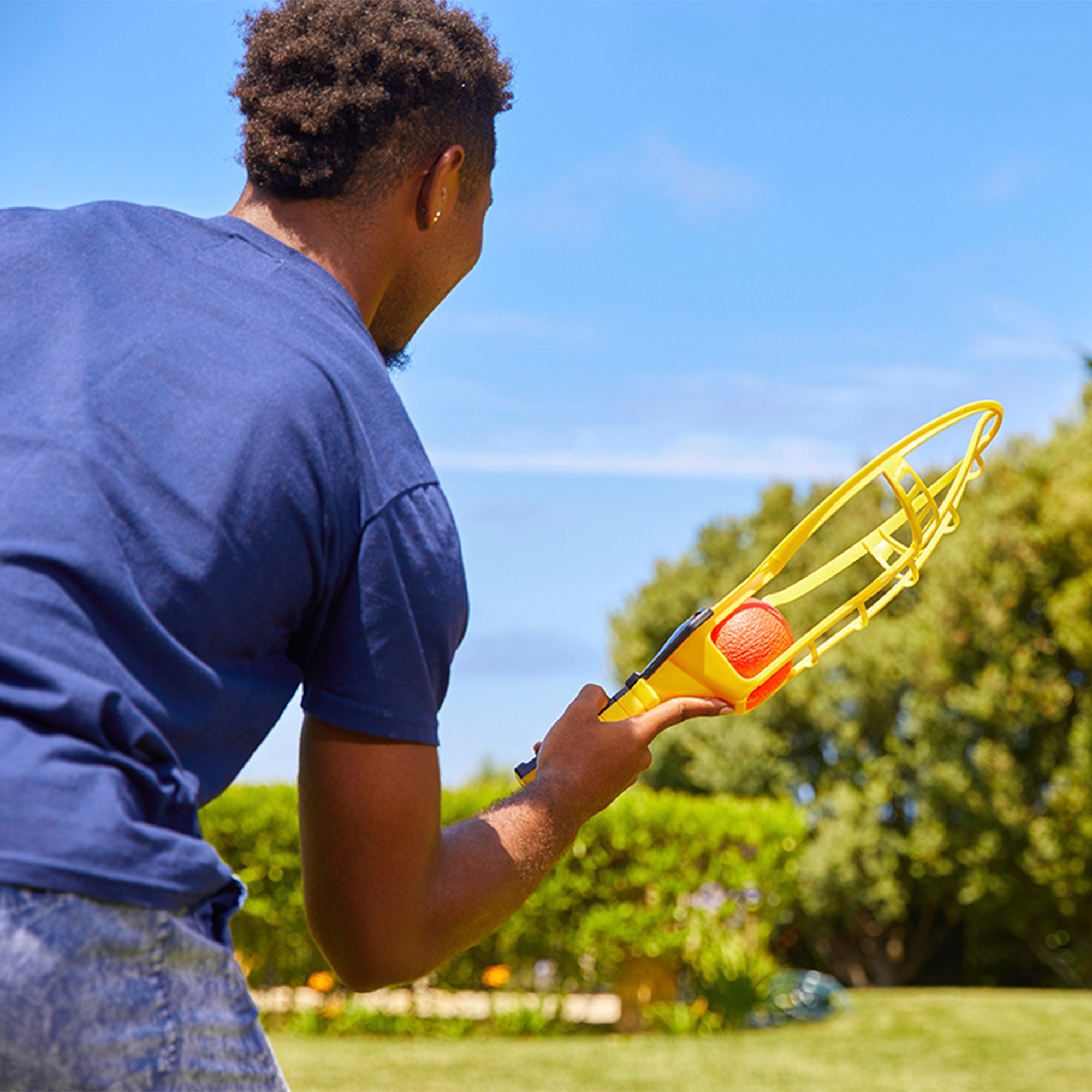Wham-O Set de raquetas grandes para niños Trac-Ball con 2 pelotas