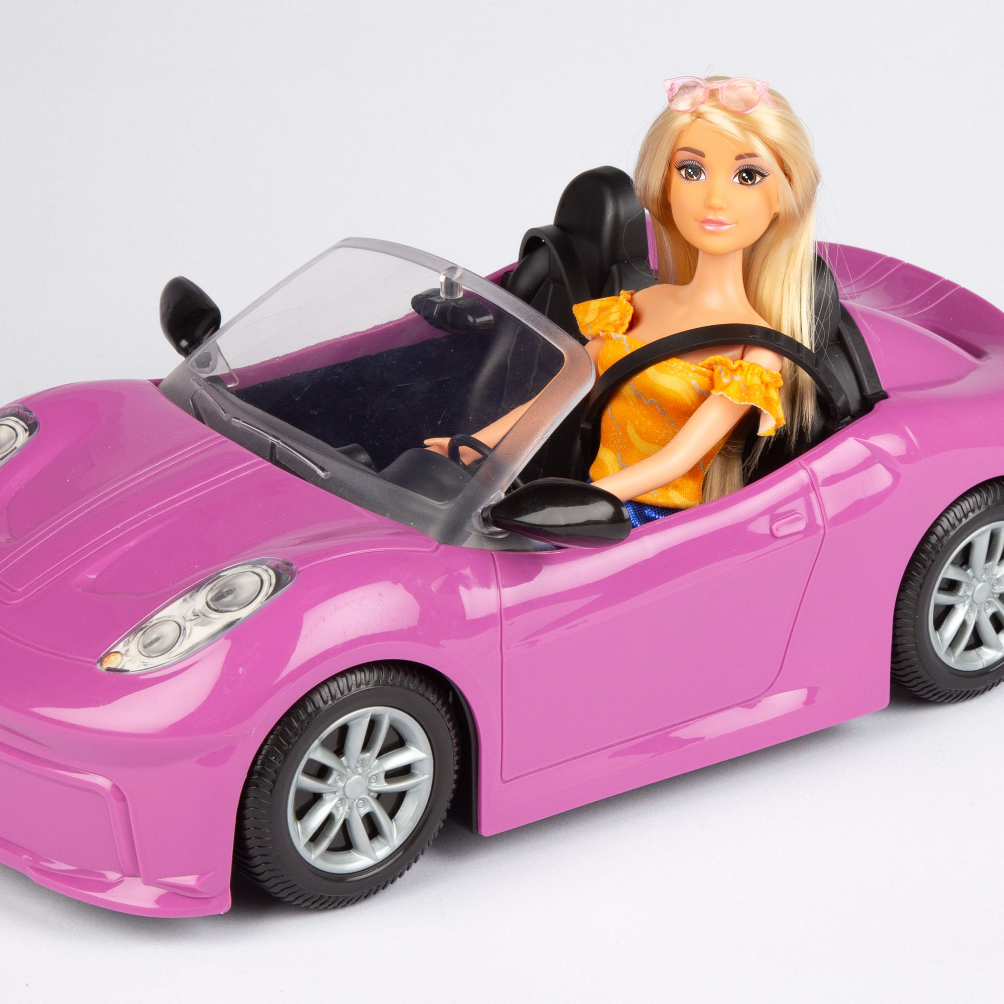 Muñeca con coche deportivo y accesorios Isabella