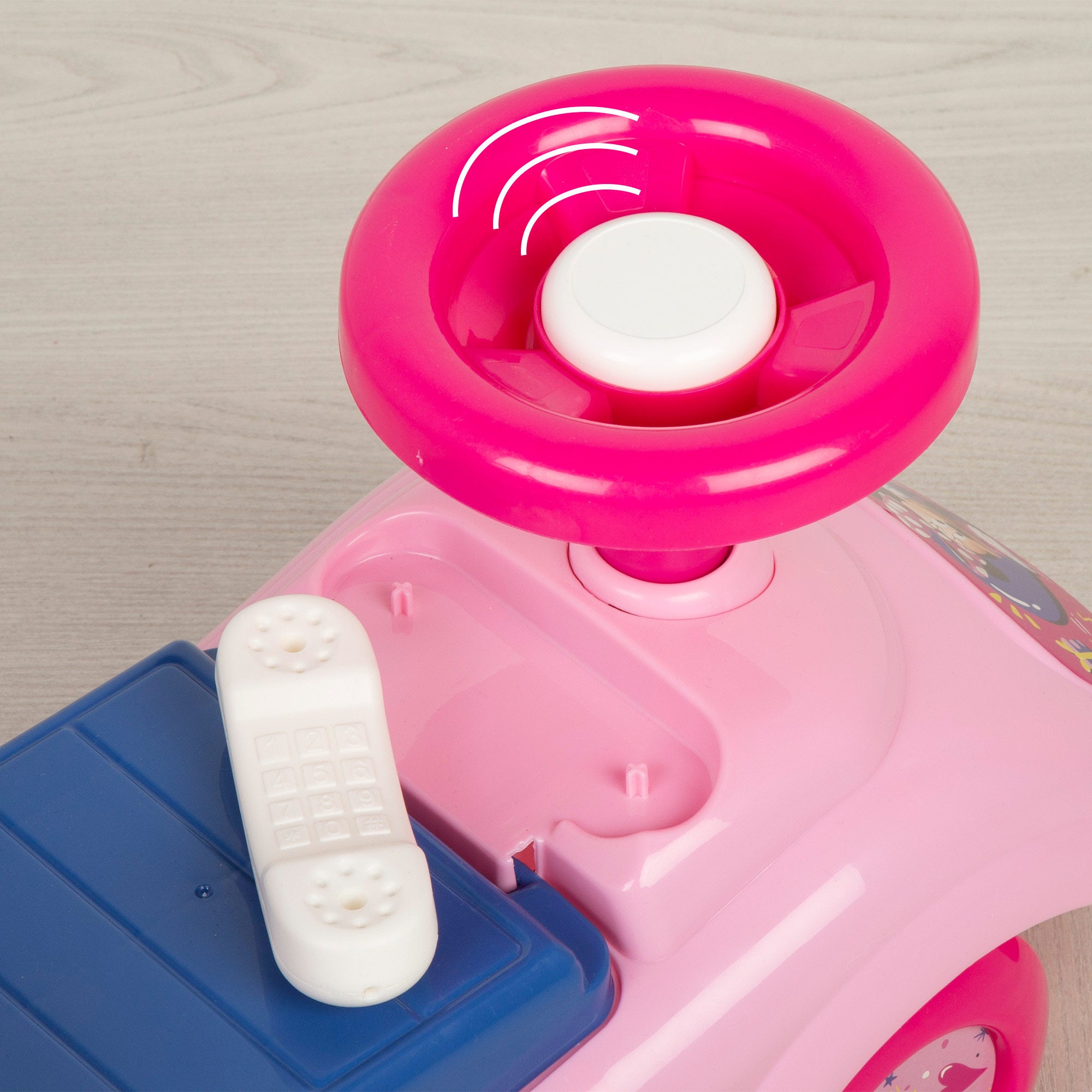 Brinquedo de encaixe da Minnie Mouse com telefone, buzina e compartimento para guardar coisas.