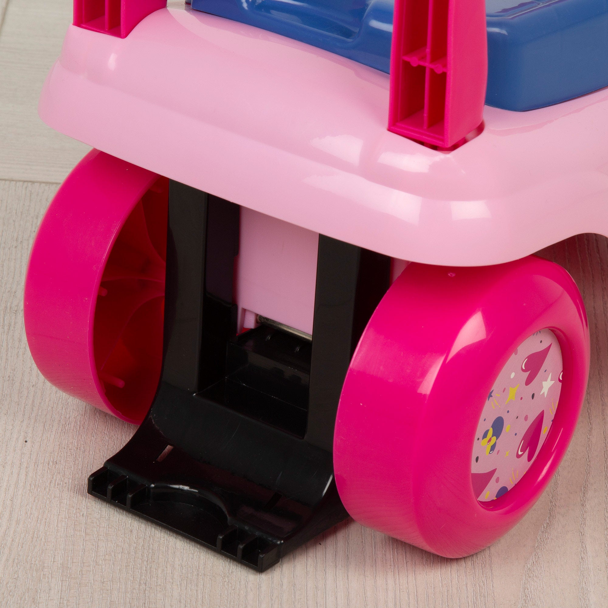 Brinquedo de encaixe da Minnie Mouse com telefone, buzina e compartimento para guardar coisas.