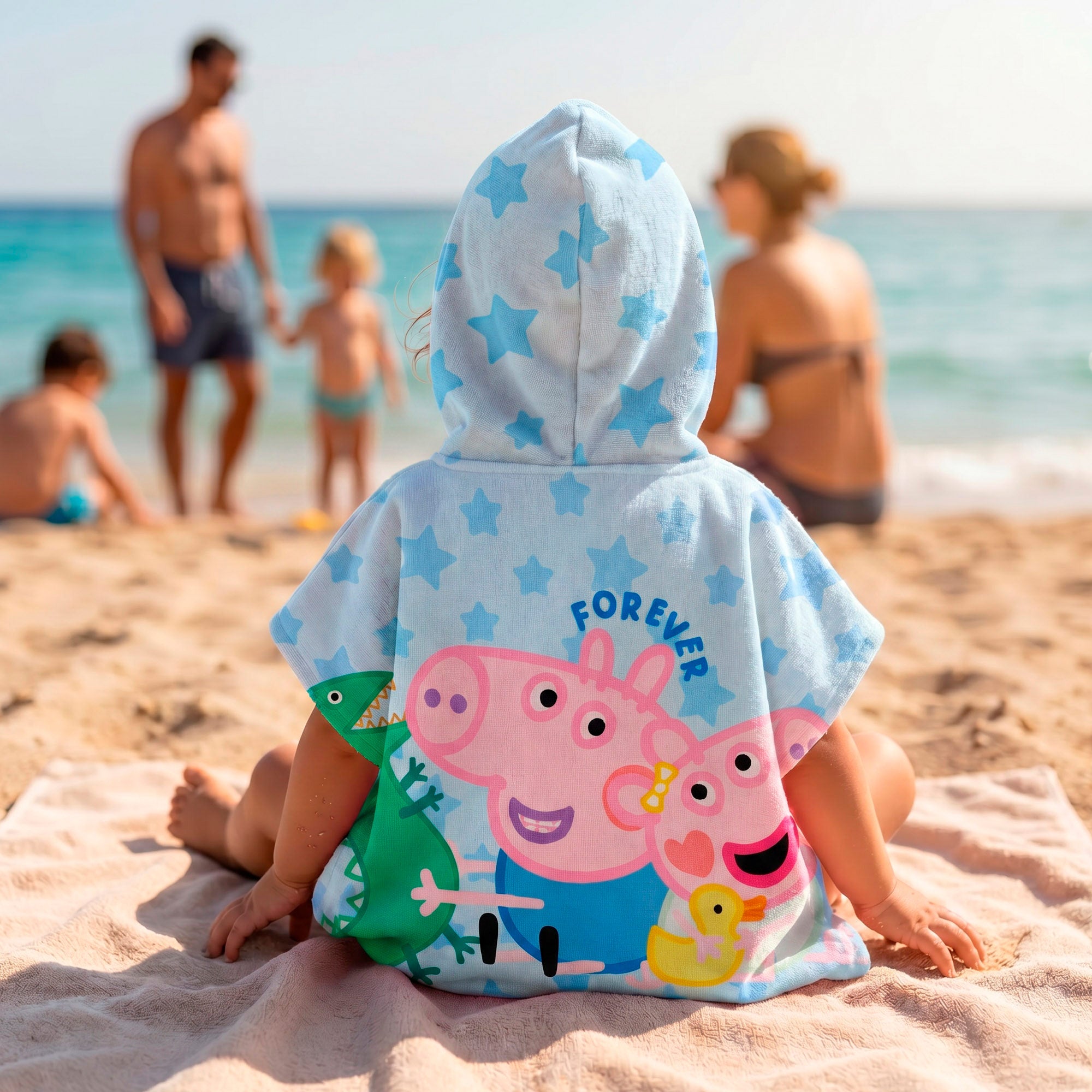 Peppa Pig Set cubo de playa con poncho, accesorios y mochila